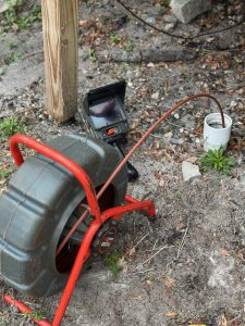 Ridgid battery operated Sewer inspection equipment in a cleanout.